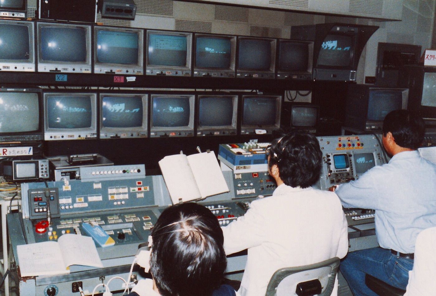 NHK master control room in Tokyo with an entire wall of CRT monitors