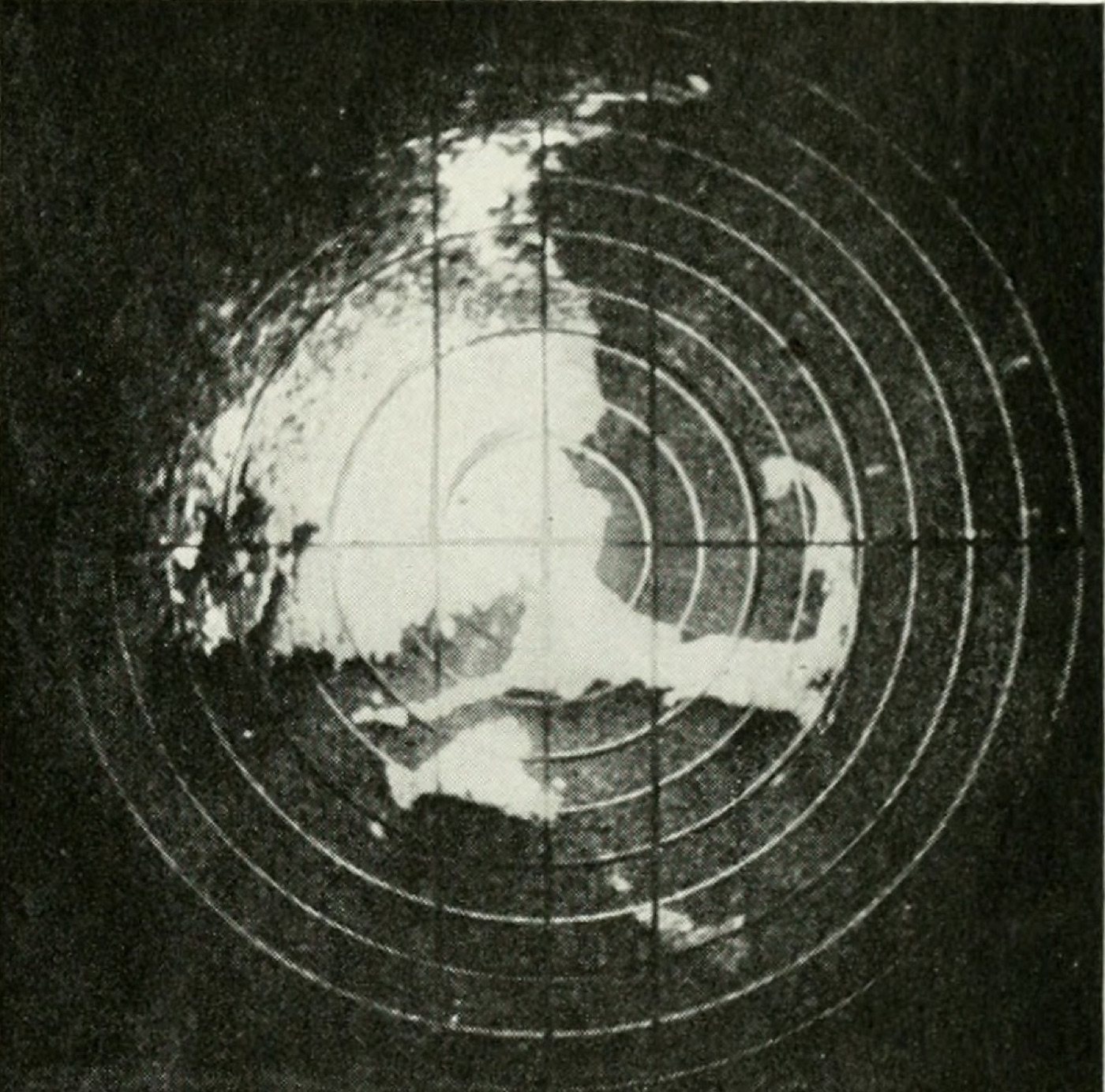 Circular WWII radar PPI scope with a glowing phosphor sweep of the Massachusetts coastline